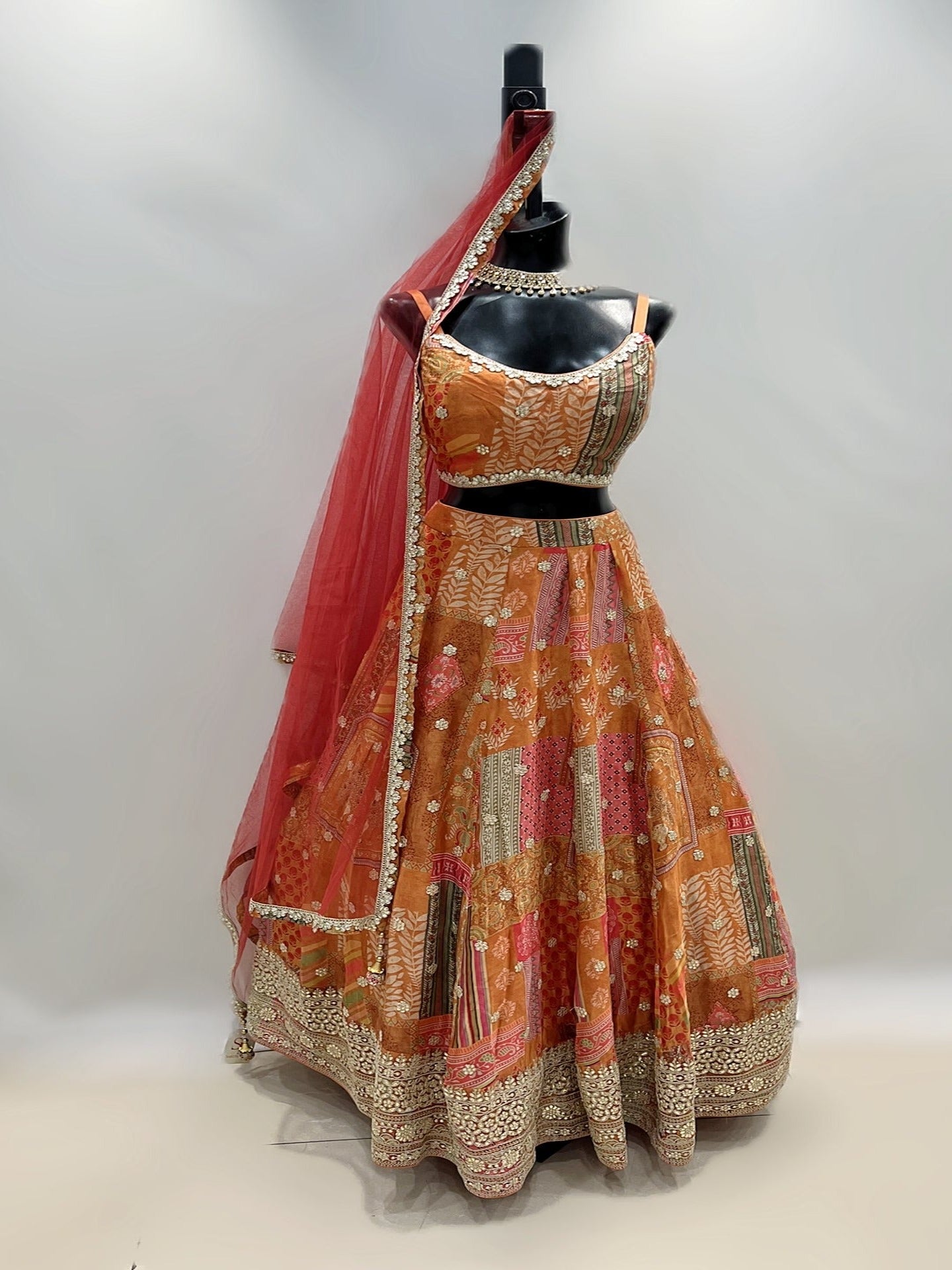 Unique Printed Orange Flowy Lehenga